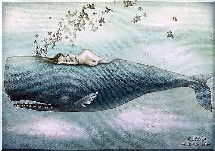 Woman resting on a whale