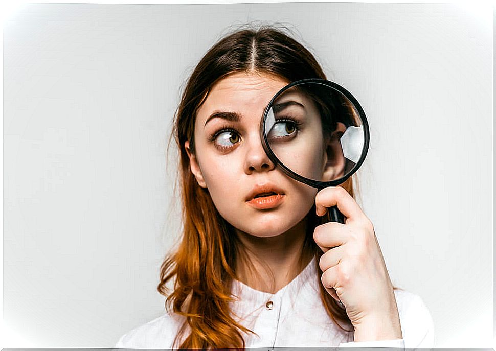 Woman with magnifying glass