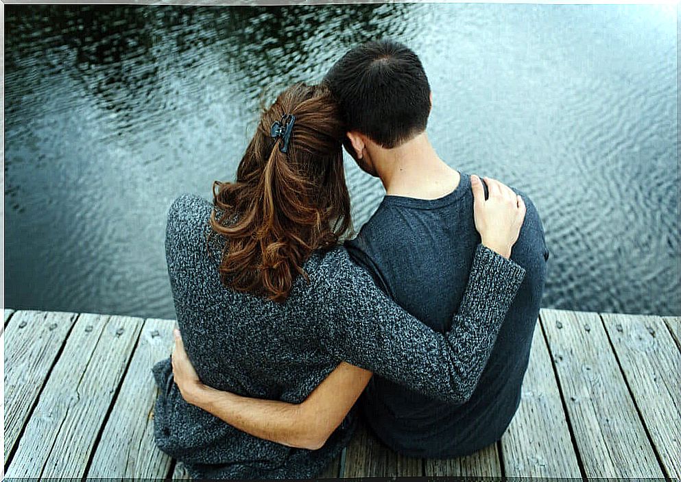 Couple embracing on jetty