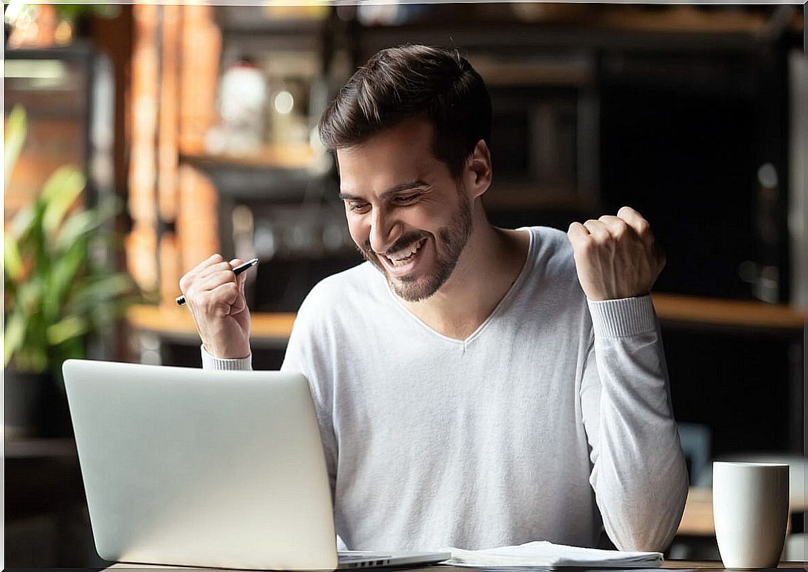 Motivated man with computer