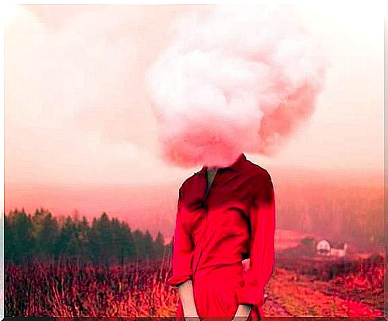 woman in red with cloud on her head