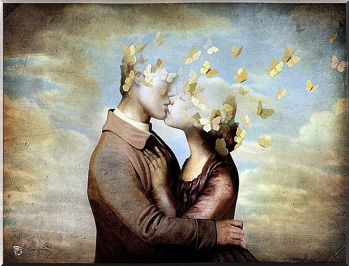 couple kissing with head in the shape of butterflies