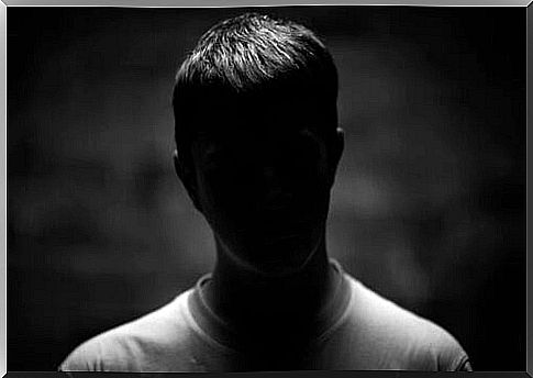 Man with darkened face