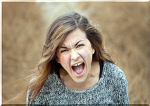 Screaming woman expressing her rage and outbursts of anger