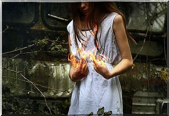 Girl with fire in hands