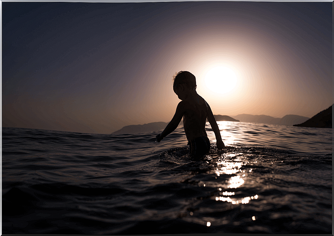 Child in the sea