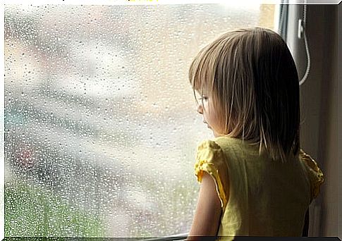 Little girl looking out the window symbolizing the brain of gifted children