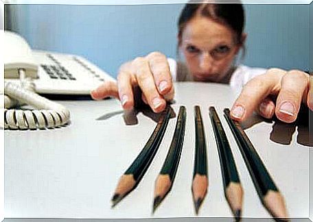 Woman sorting pencils