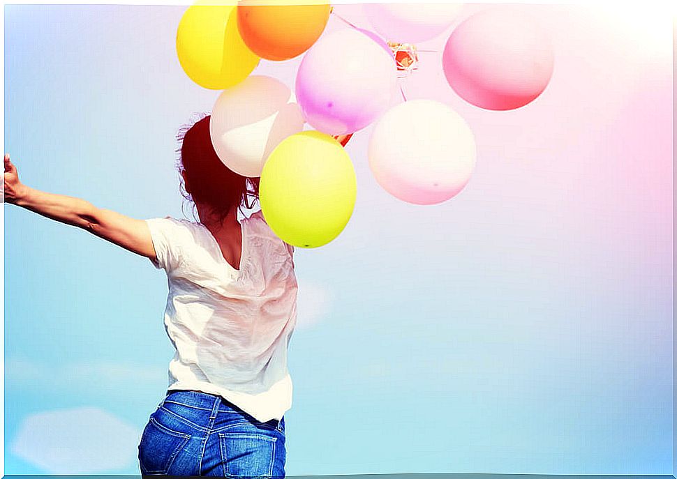 Woman with colorful balloons