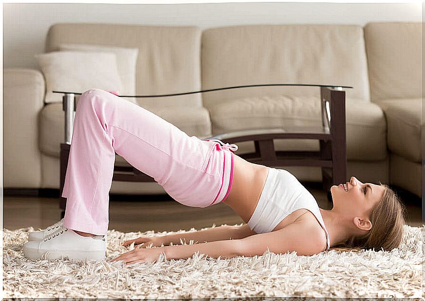 Woman exercising at home